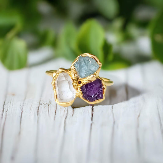 Custom family birthstone cluster ring with raw gemstones in gold setting, ideal Mother's ring or unique gift.