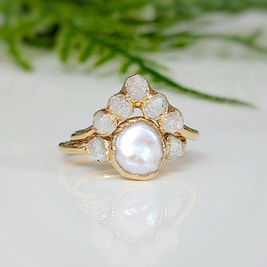 Freshwater pearl and raw diamond wedding ring set with gold band, featuring a rustic romantic design.