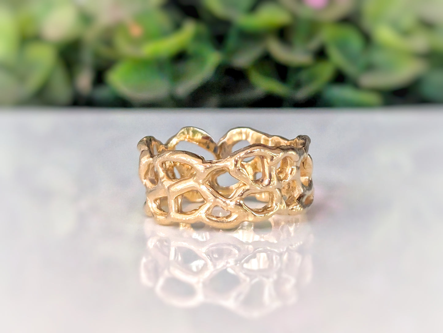 Molten Silver Honeycomb ring, uniquely hand-carved, solid silver with an abstract, nature-inspired design.