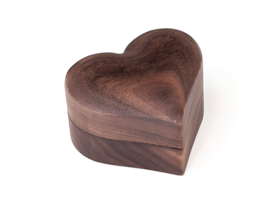 Heart-shaped wooden ring gift box, perfect for presenting jewelry, made from lovely walnut wood.