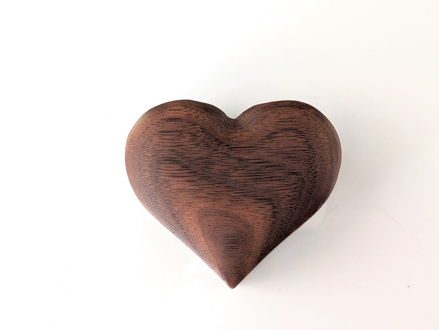 Heart-shaped wooden ring gift box made from walnut, ideal for engagement rings.