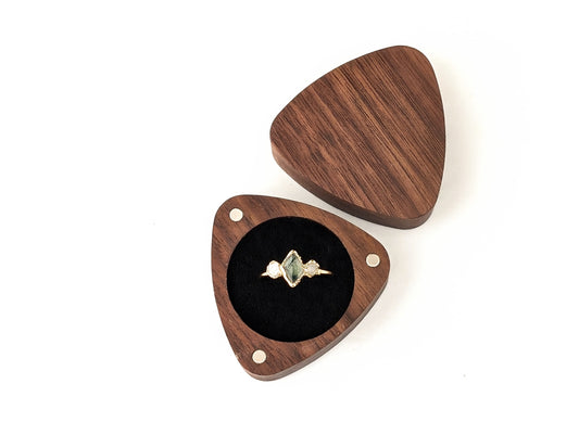 Triangular shape wooden ring gift box with an engagement ring inside, perfect for presentation and gifting.