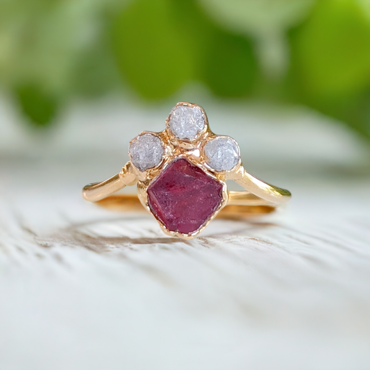 Raw diamond and pink spinel chevron engagement ring with unique rustic design, handcrafted to symbolize love.