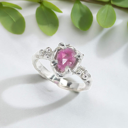 Elegant hand-carved Pink Sapphire engagement ring in sterling silver, featuring a unique nature-inspired design.