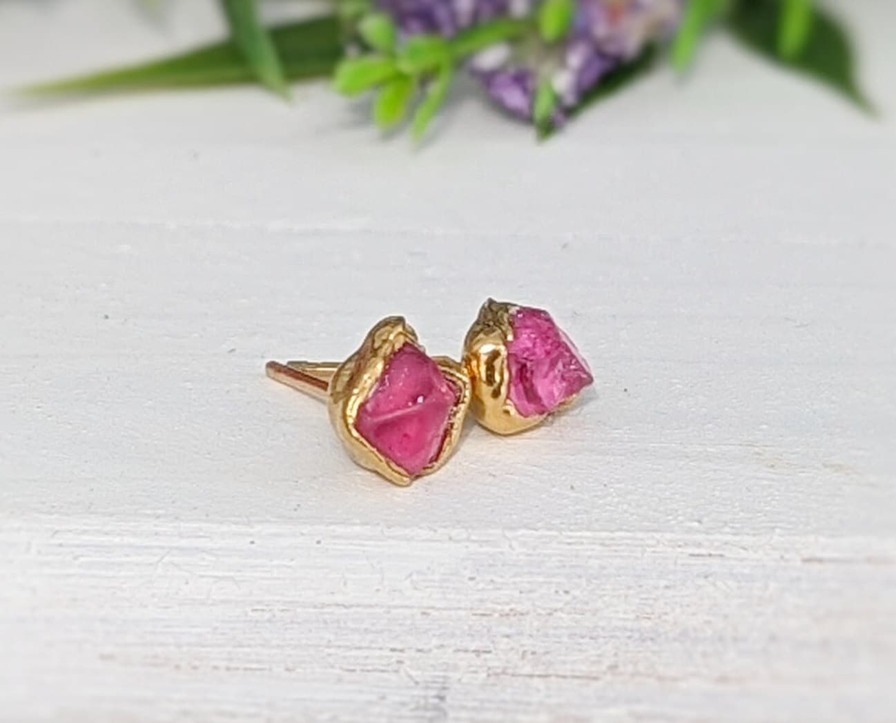 Raw pink Spinel stud earrings with gold-filled backing, handcrafted for a unique and elegant look.