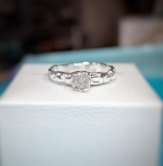 Rough diamond engagement ring in recycled Sterling Silver with Molten texture and unique design.