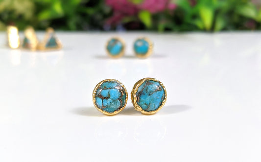 Turquoise stud earrings with 10mm round copper stones set on 14k Gold filled posts, perfect for any occasion.