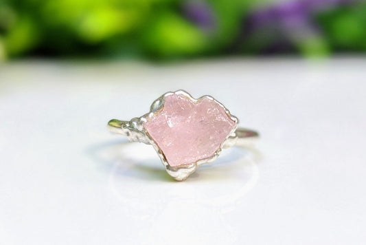 Raw pink Morganite ring on Sterling Silver band, showcasing rustic elegance and handcrafted design.
