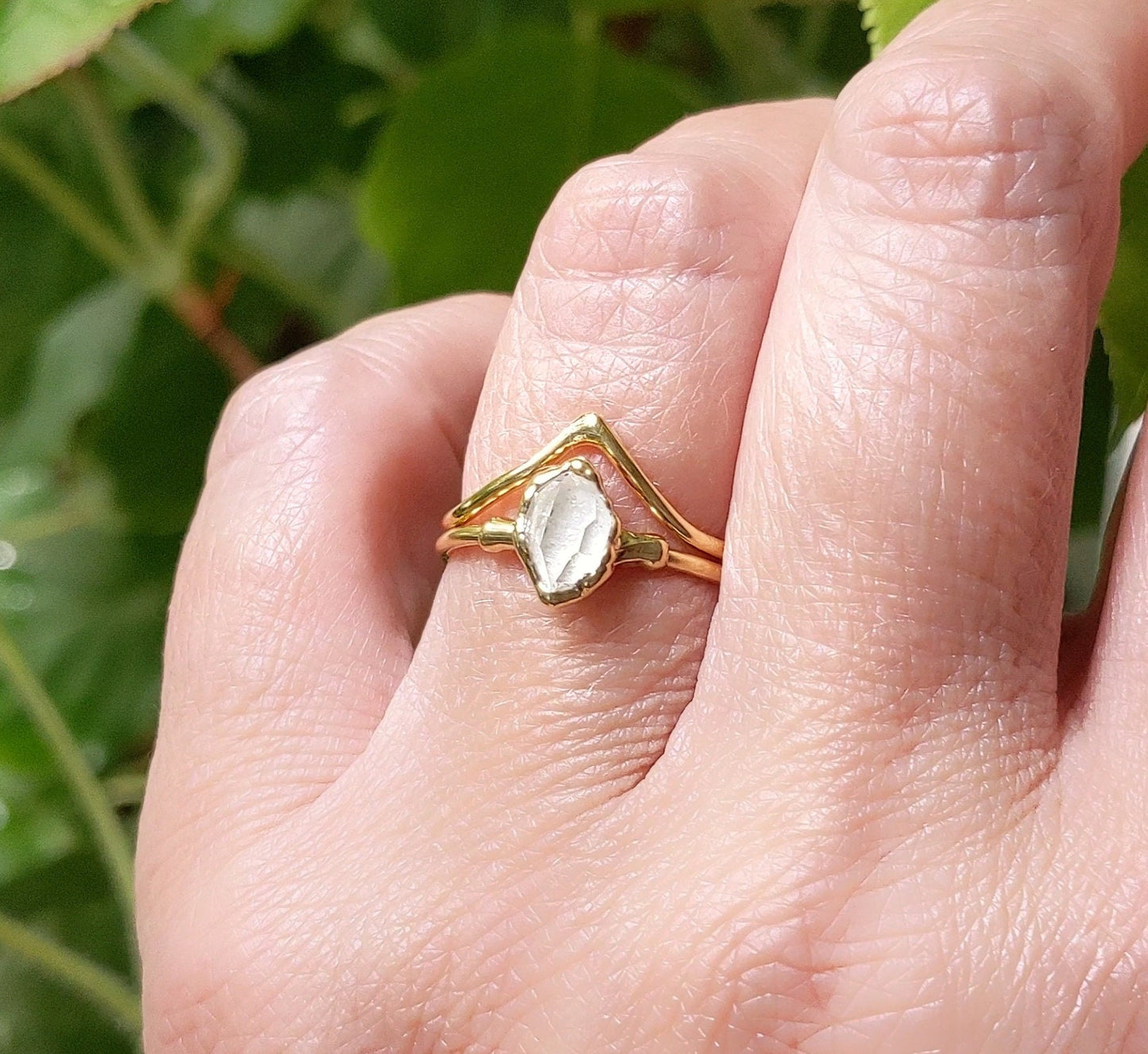 Herkimer diamond chevron engagement ring set on hand, showcasing unique design and handcrafted elegance.