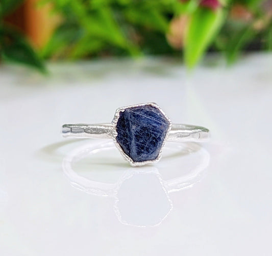 Raw blue Sapphire ring on a handcrafted Sterling Silver band, perfect for unique gifts and special occasions.