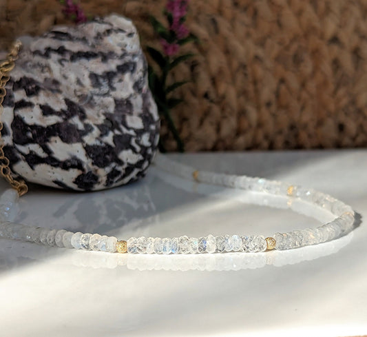 Rainbow Moonstone faceted beaded necklace showcasing ethereal beauty and natural healing properties.