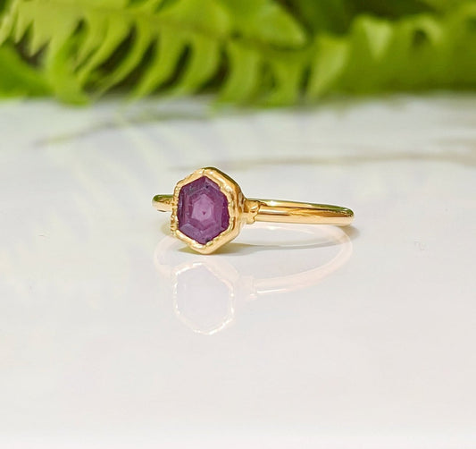 Pink Star Sapphire ring in 18k gold, unique handcrafted design perfect for engagements or special gifts.