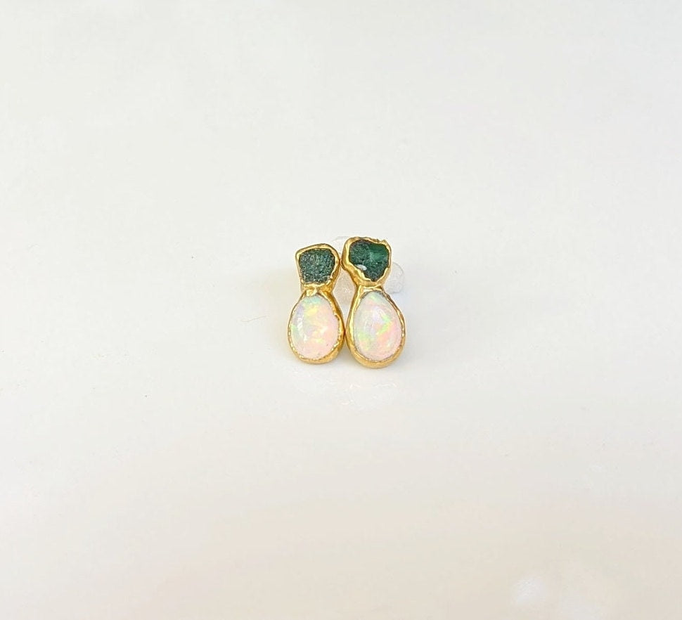 Dainty raw Emerald and Opal stud earrings with gold accents, handcrafted for elegance and uniqueness.