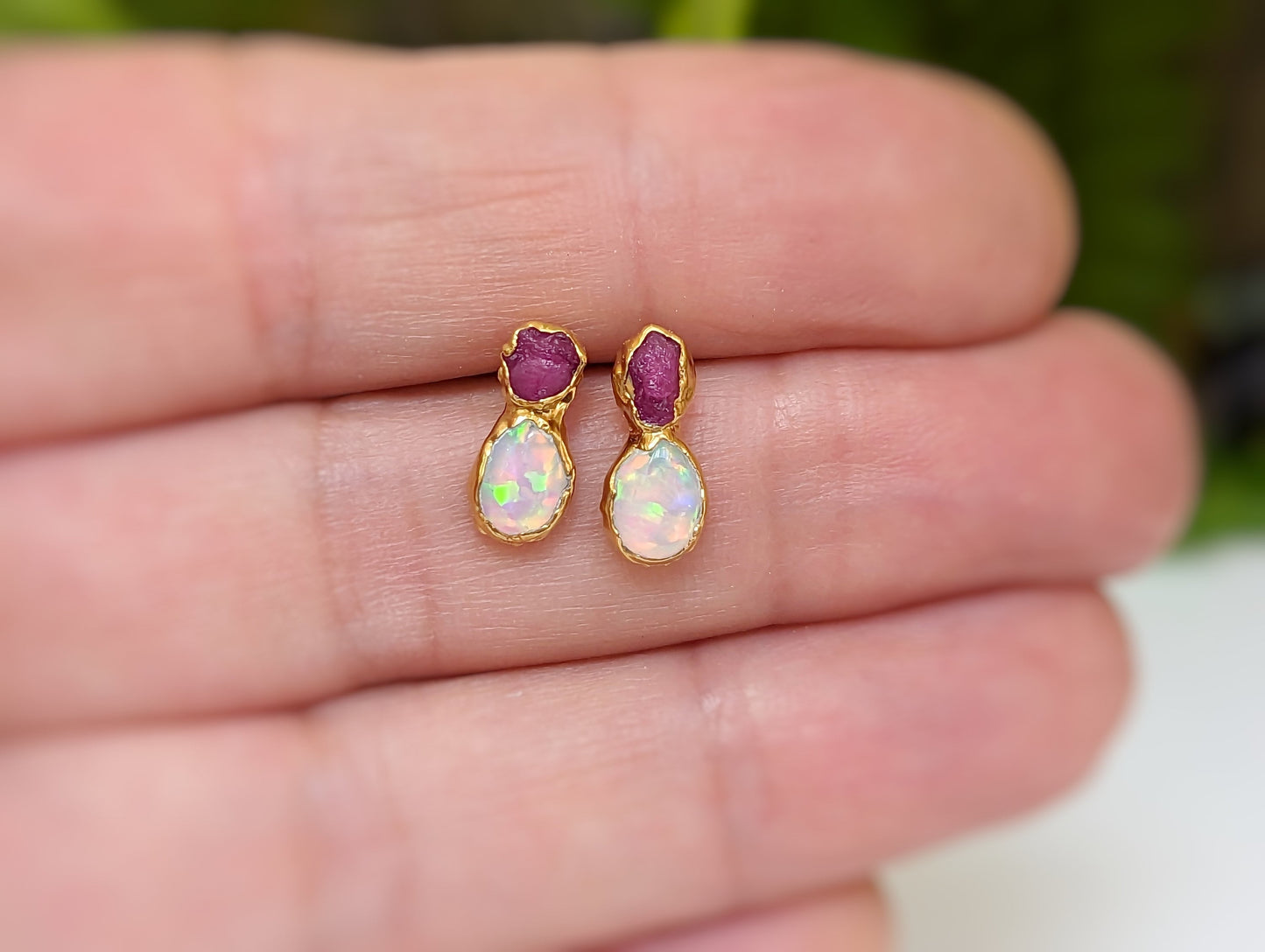 Handcrafted raw Ruby and Opal stud earrings in gold setting, showcasing a unique design for elegant everyday wear.