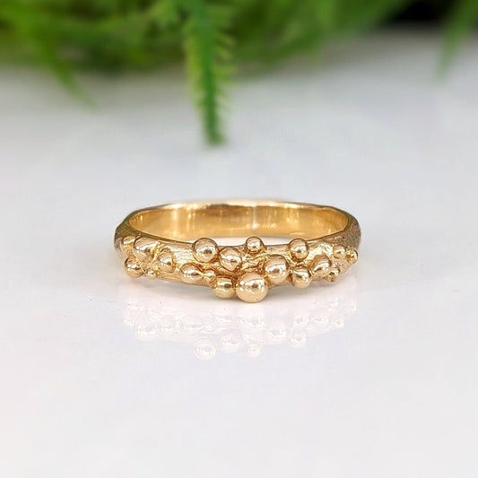 Solid 14k Gold Dew Drop beaded molten ring, featuring an organic abstract design for unique elegance.