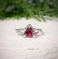 Rubellite Tourmaline textured ring in sterling Silver, featuring a stunning dark pink trilliant gemstone.