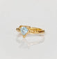 Solid Gold Aquamarine ring with organic textured band, perfect for engagement or special gifts.