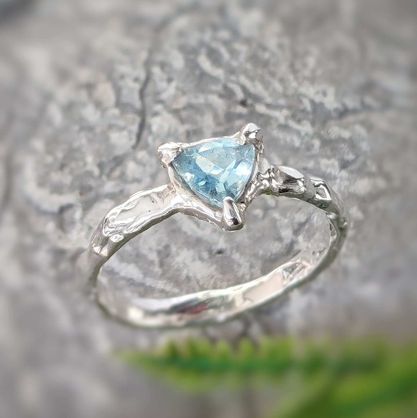 Sterling Silver Aquamarine ring with organic textured band, featuring a mesmerizing blue crystal, perfect for engagement or gifts.