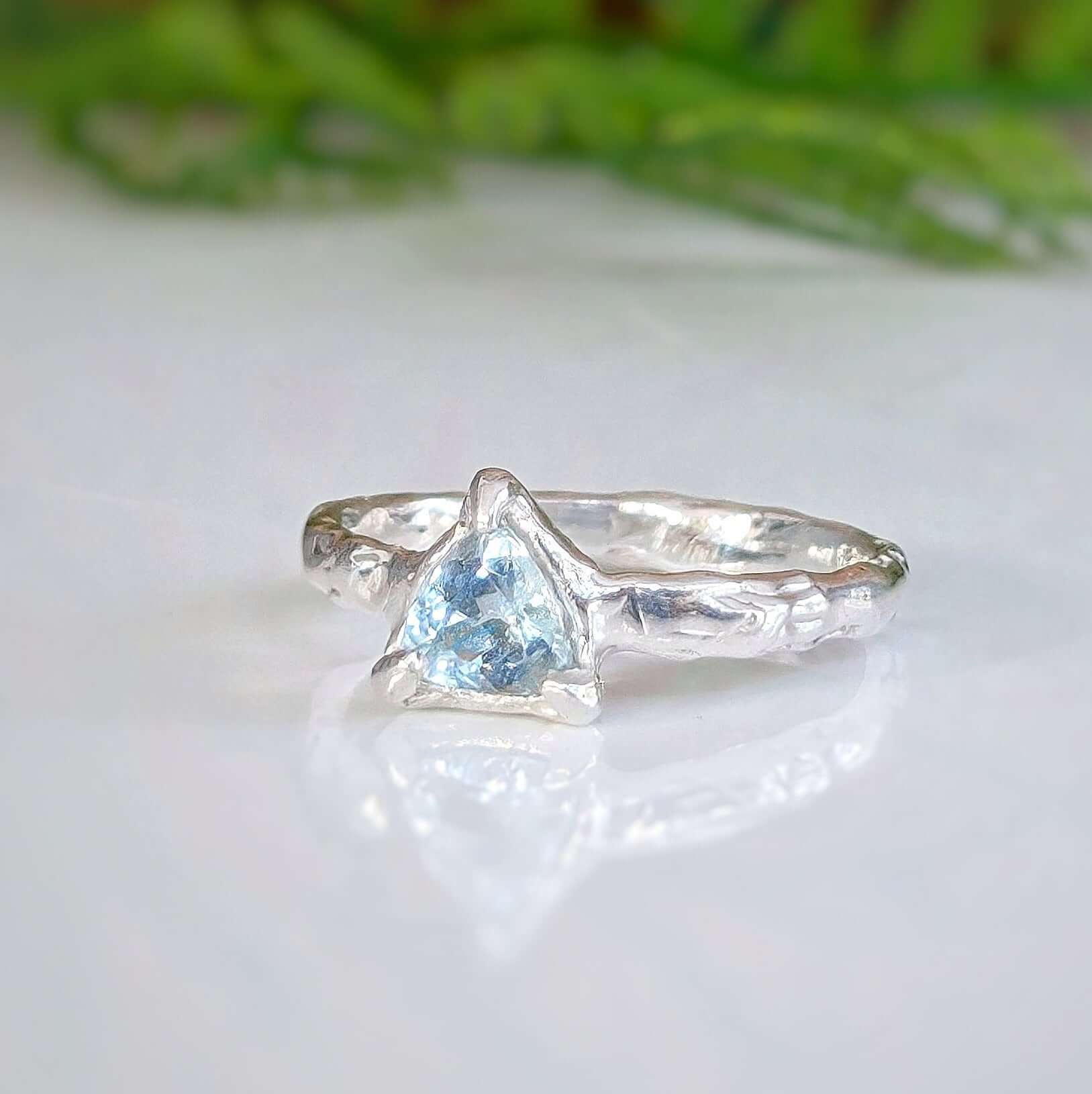 Unique handcrafted Aquamarine ring in Sterling Silver with organic textured band, perfect for engagements or special gifts.
