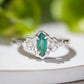 Silver Emerald and diamond engagement ring