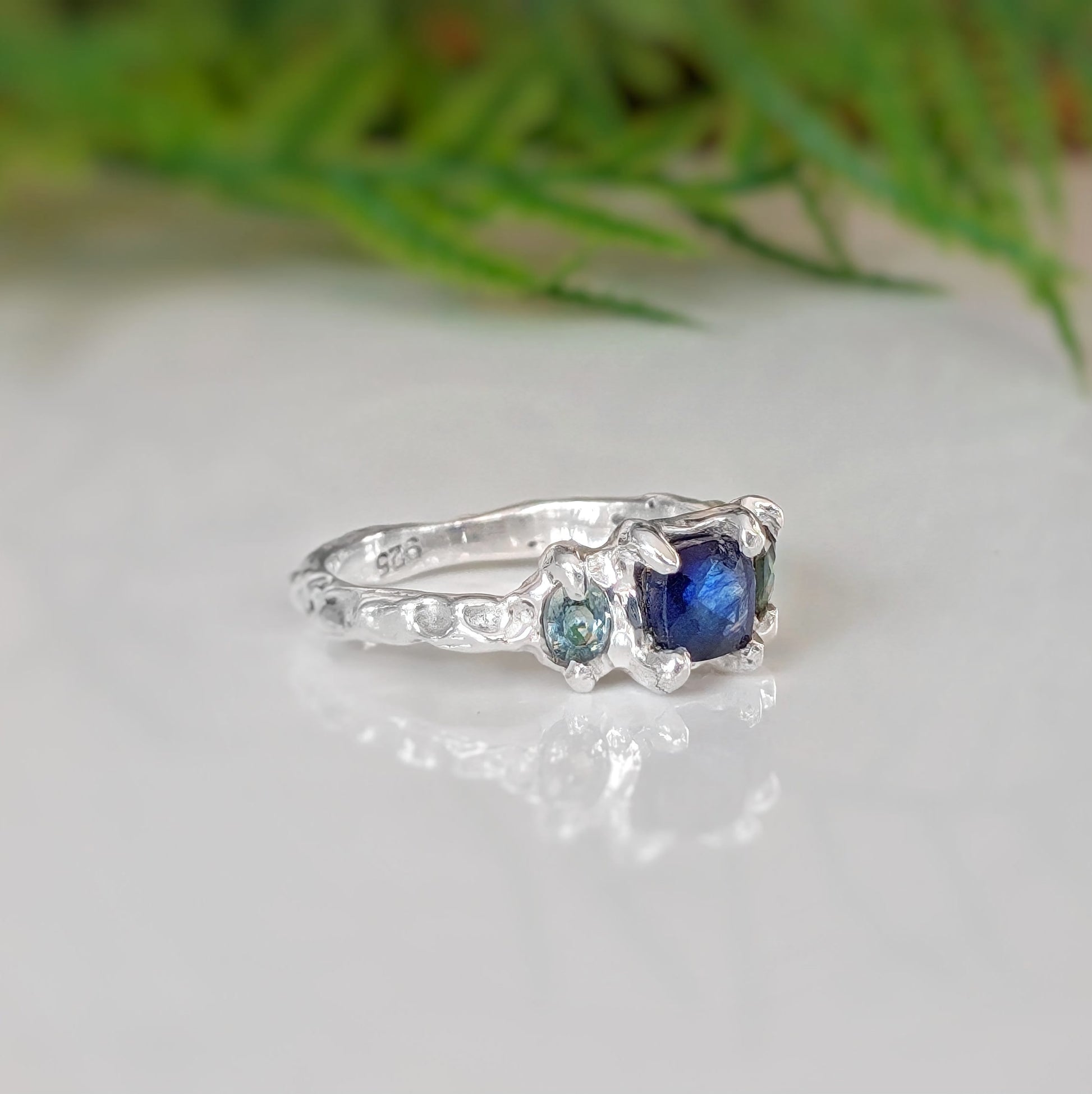 Blue Sapphire and Tourmaline ring in textured molten Silver setting