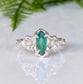 Silver Emerald and diamond engagement ring