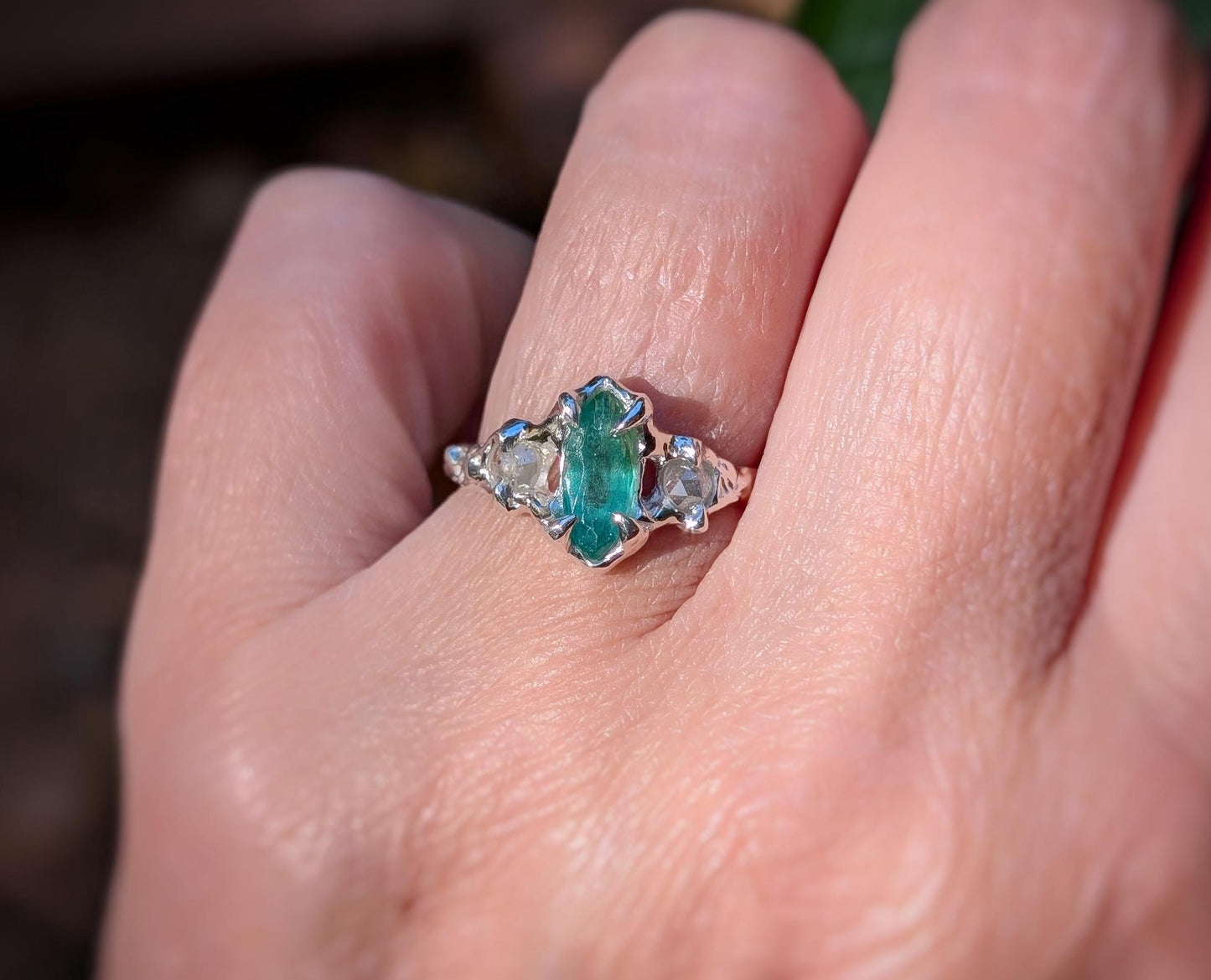 Silver Emerald and diamond engagement ring