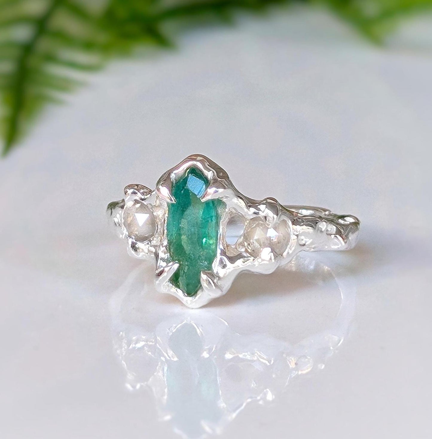 Silver Emerald and diamond engagement ring