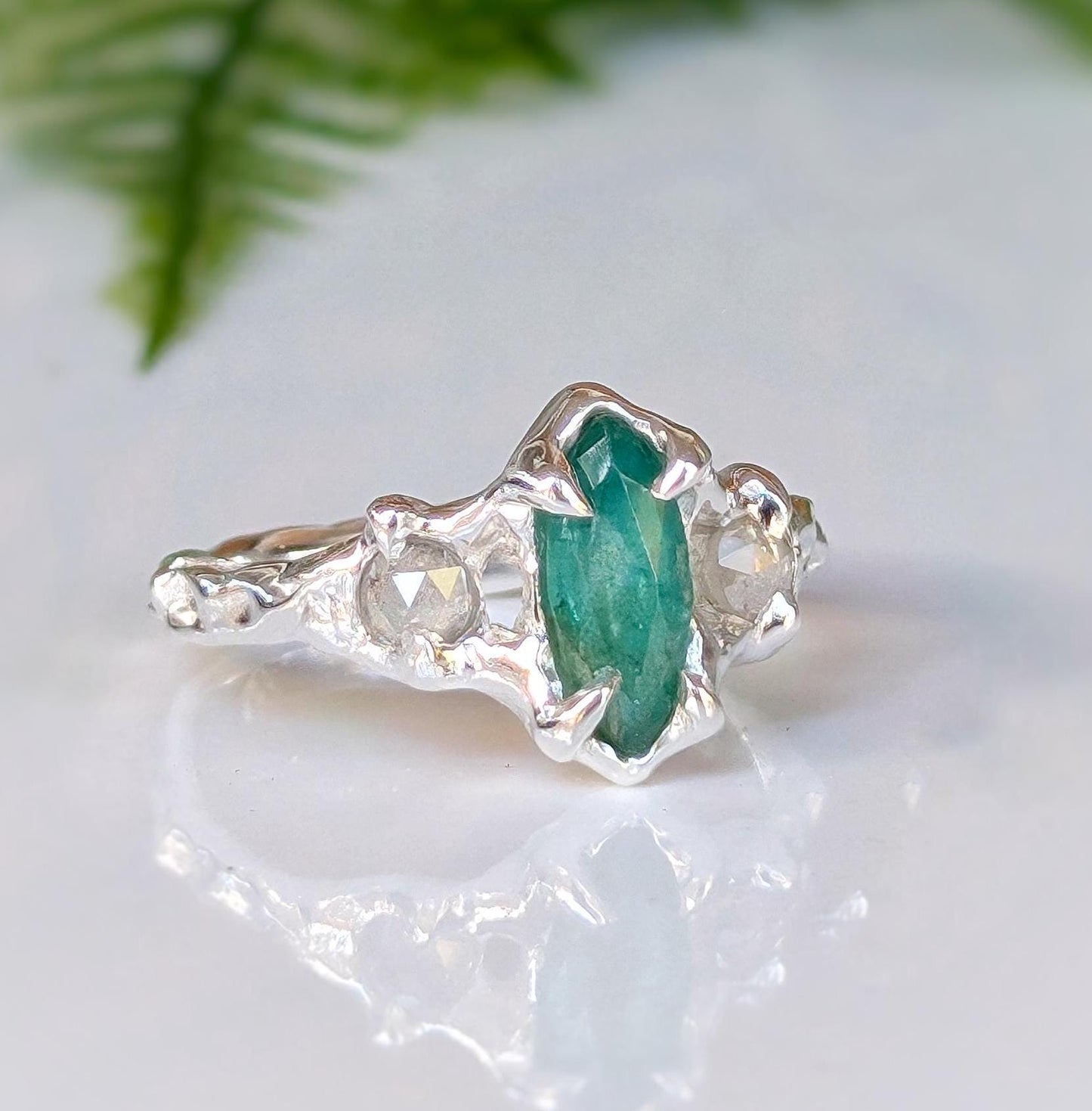 Silver Emerald and diamond engagement ring