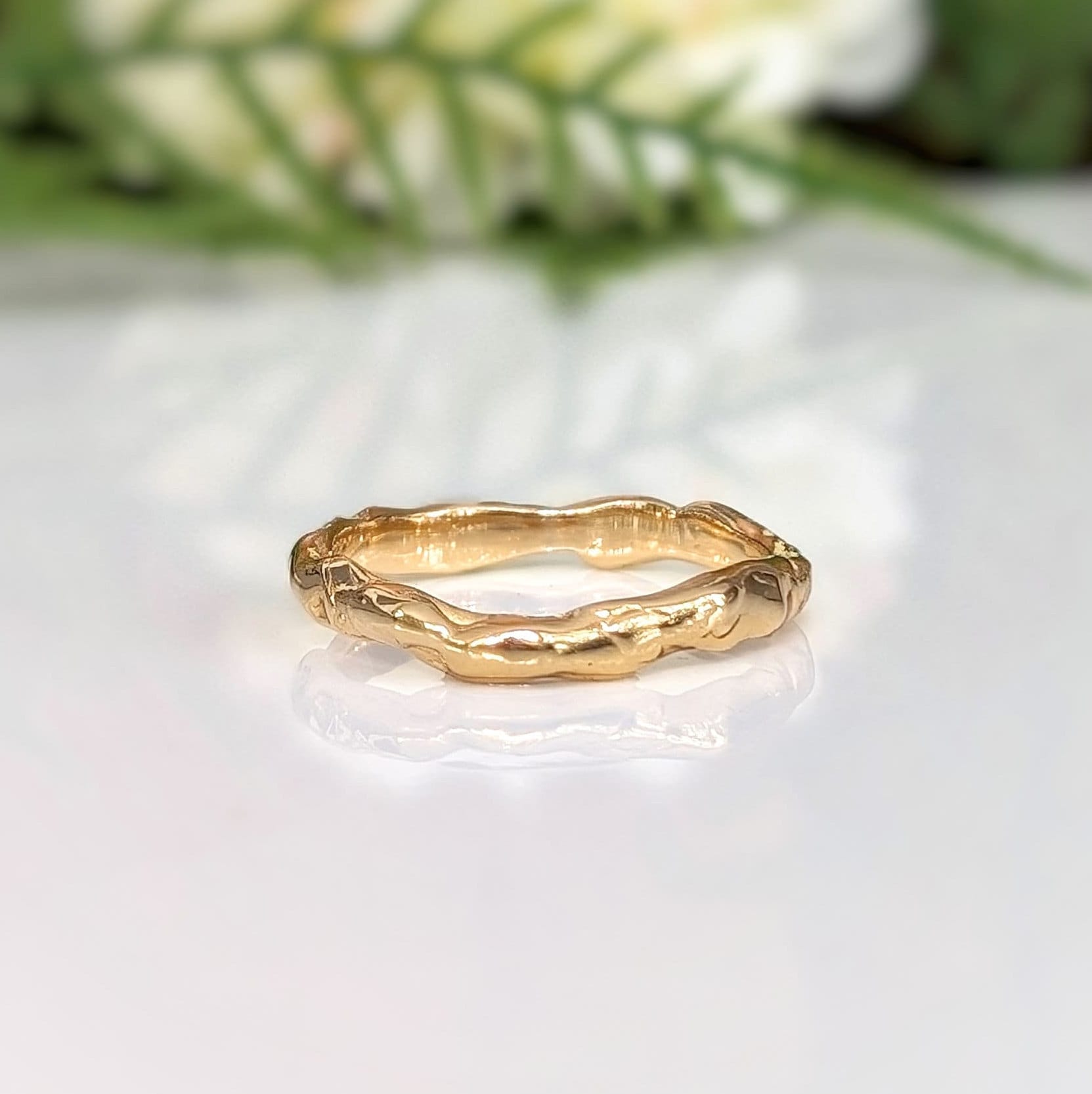 Simple Textured Molten Gold wedding band in solid 14k gold