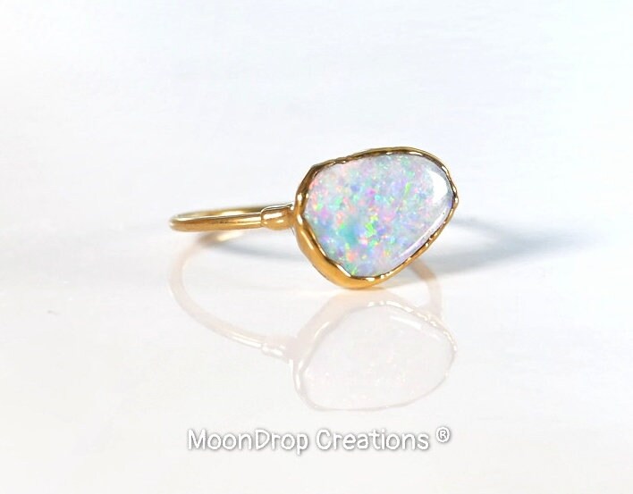White Australian Fire Opal ring in unique 18k Gold setting