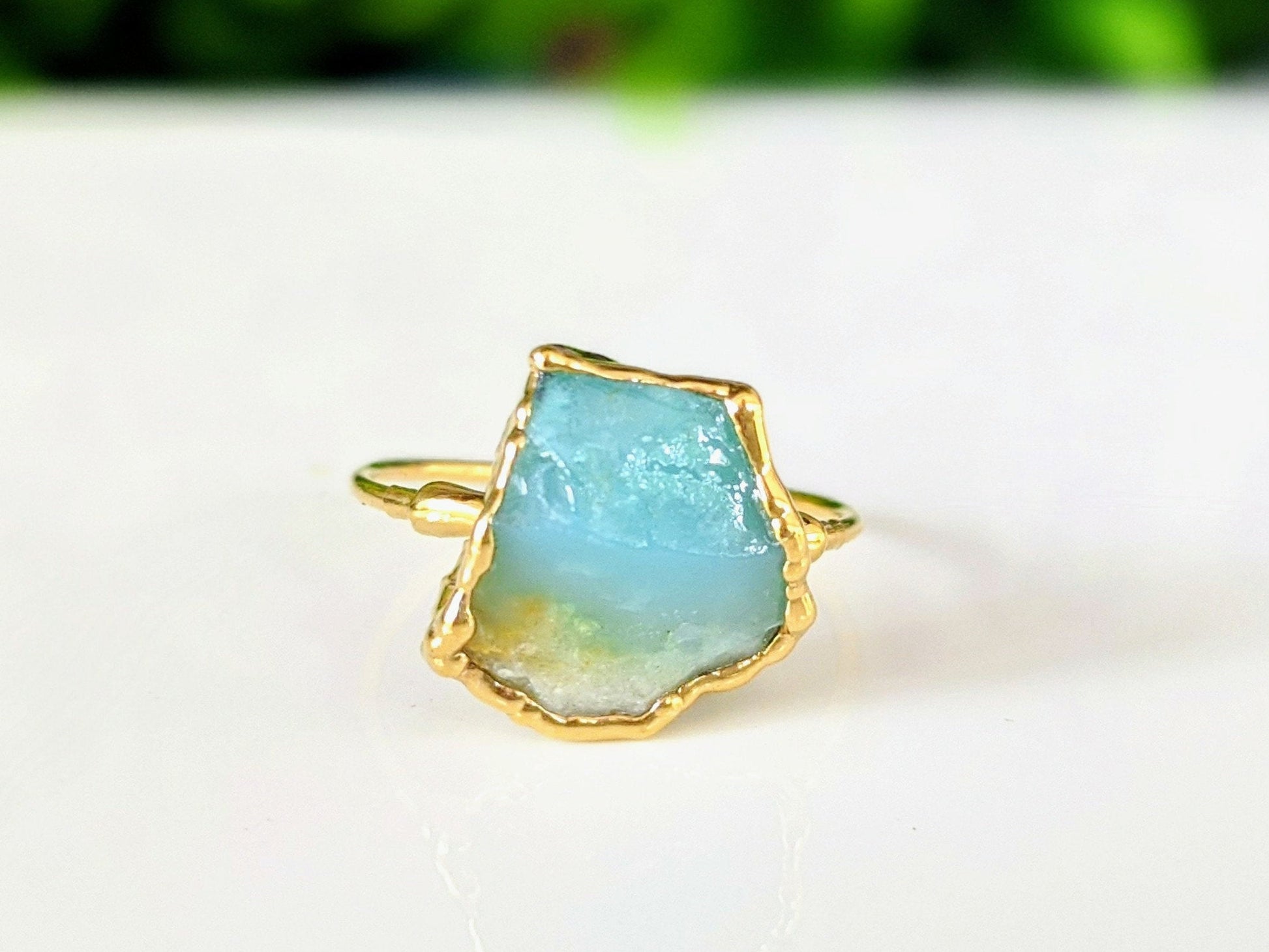 Raw Aqua Blue Peruvian Opal ring uniquely set in 18k Gold