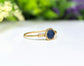 Raw Blue Sapphire ring uniquely set in 18k Gold