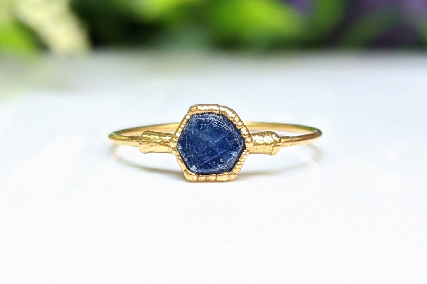 Raw Blue Sapphire ring uniquely set in 18k Gold