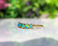 Raw blue Opal Eternity ring uniquely set in 18k Gold 