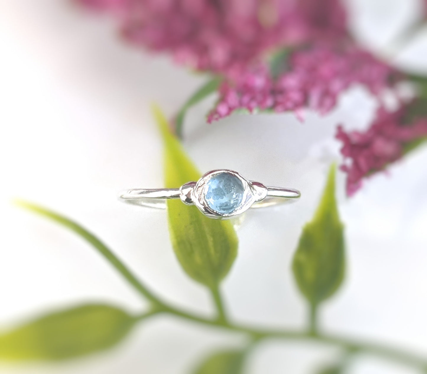 Dainty Blue Topaz December Birthstone Stacking ring in unique Sterling Silver setting