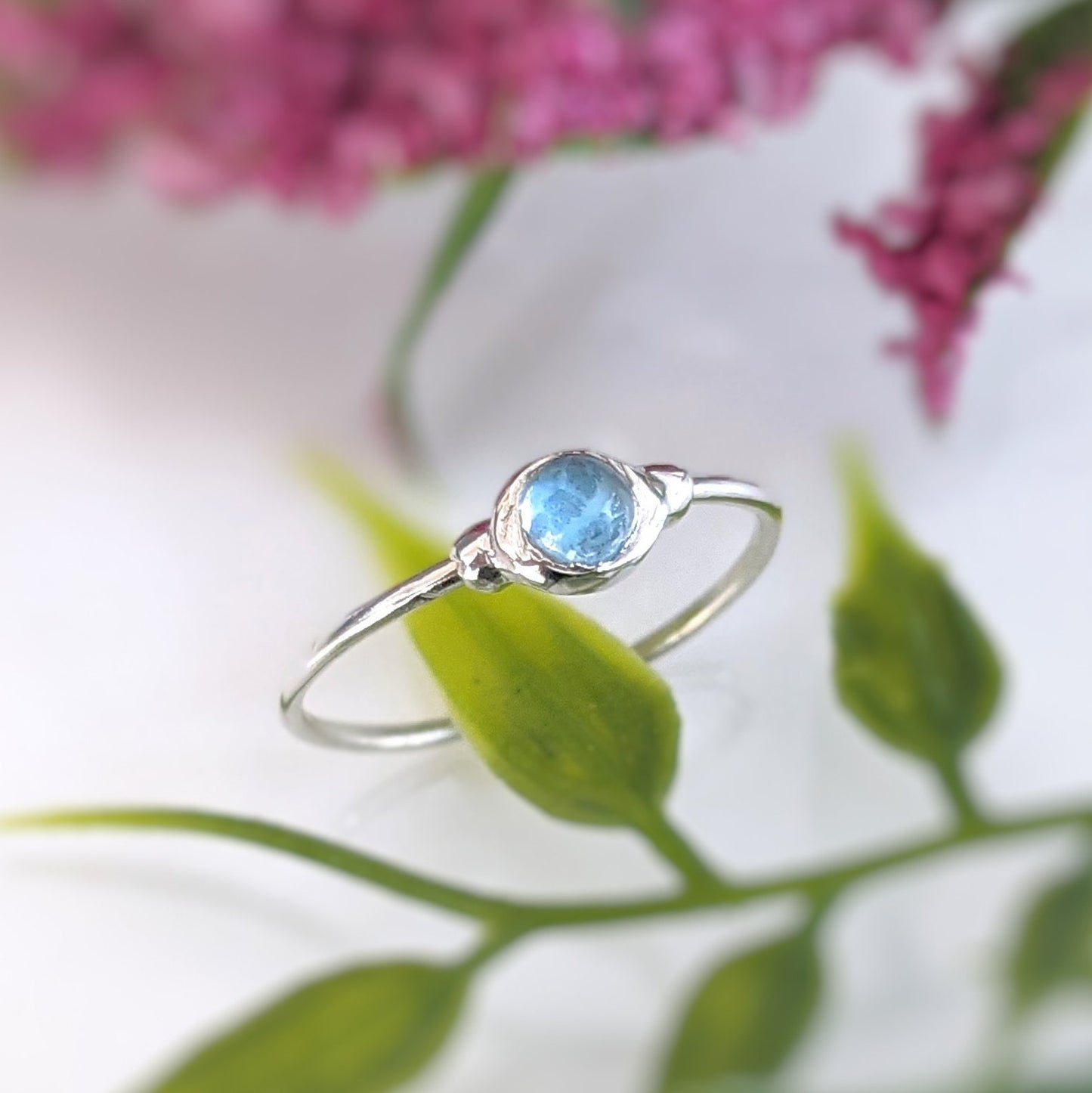 Dainty Blue Topaz December Birthstone Stacking ring in unique Sterling Silver setting
