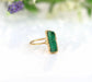 Raw Emerald ring set in unique 18k Gold setting