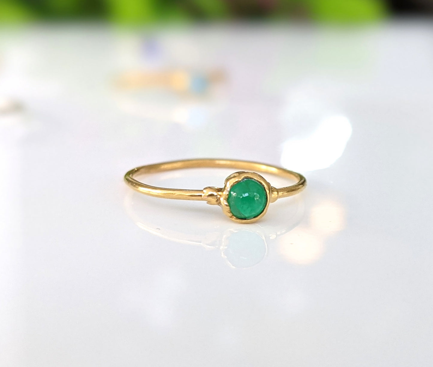 Dainty Emerald stacking ring in 18k GOld