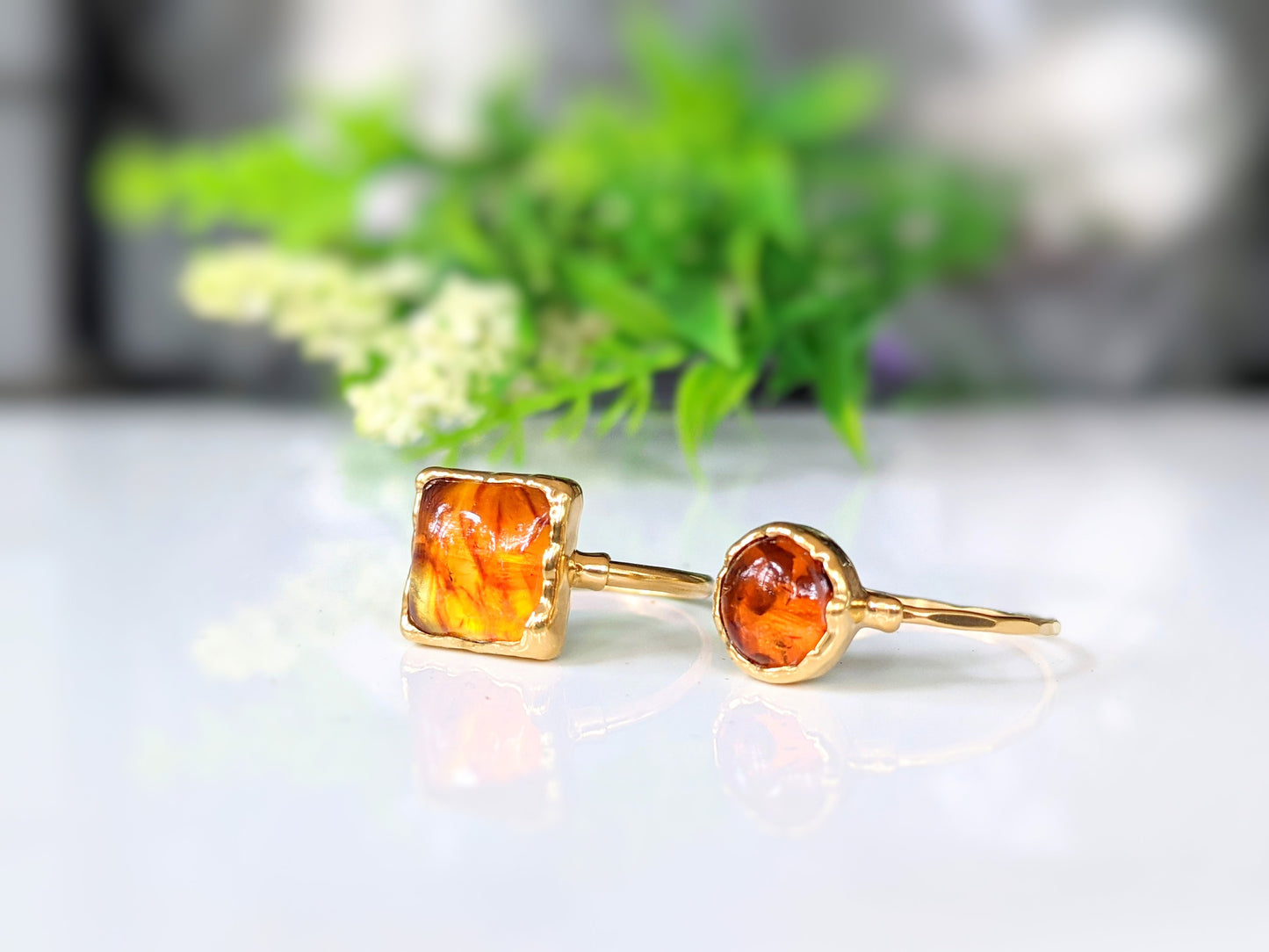 Square and round Baltic Amber rings in unique 18k Gold setting