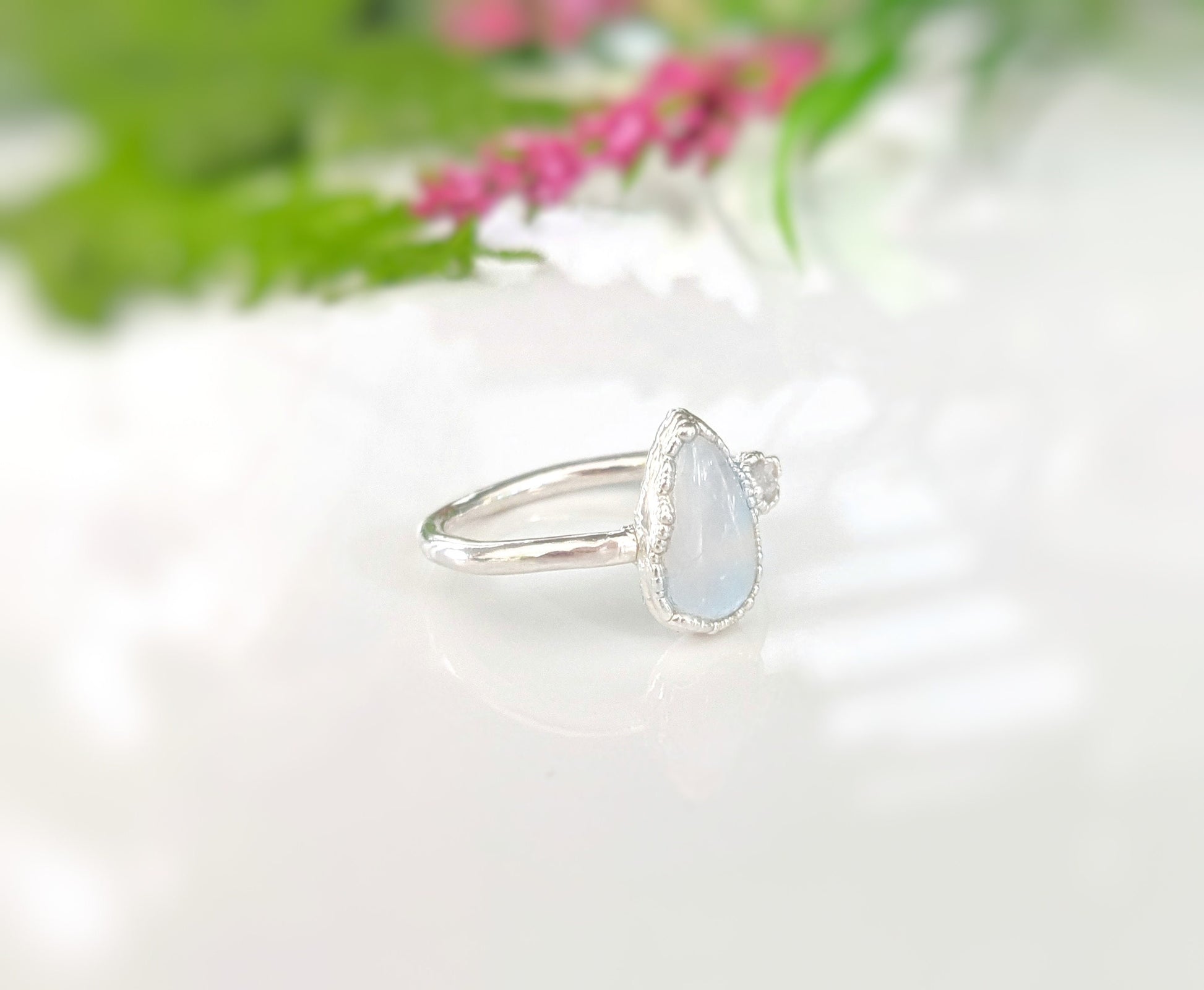 Pear shape Rainbow Moonstone and raw Diamond Engagement ring in unique Fine 99.9 Silver setting
