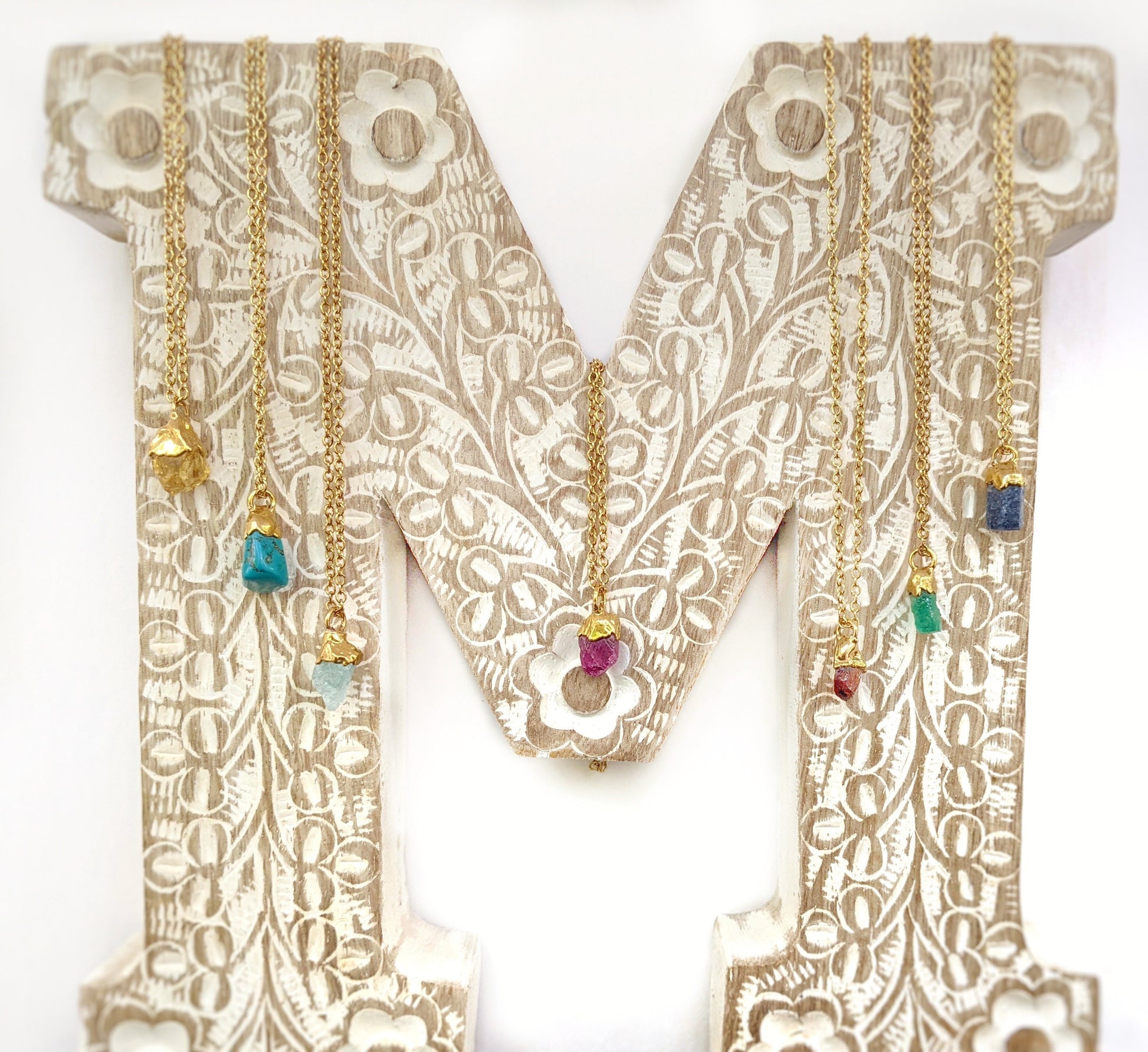 Raw Gemstone Necklaces uniquely set in 18k Gold