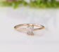 Raw diamond solitaire engagement ring in 18k Gold