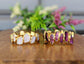 Raw Rose Quartz and Rhodolite Garnet Eternity rings in unique 18k Gold setting