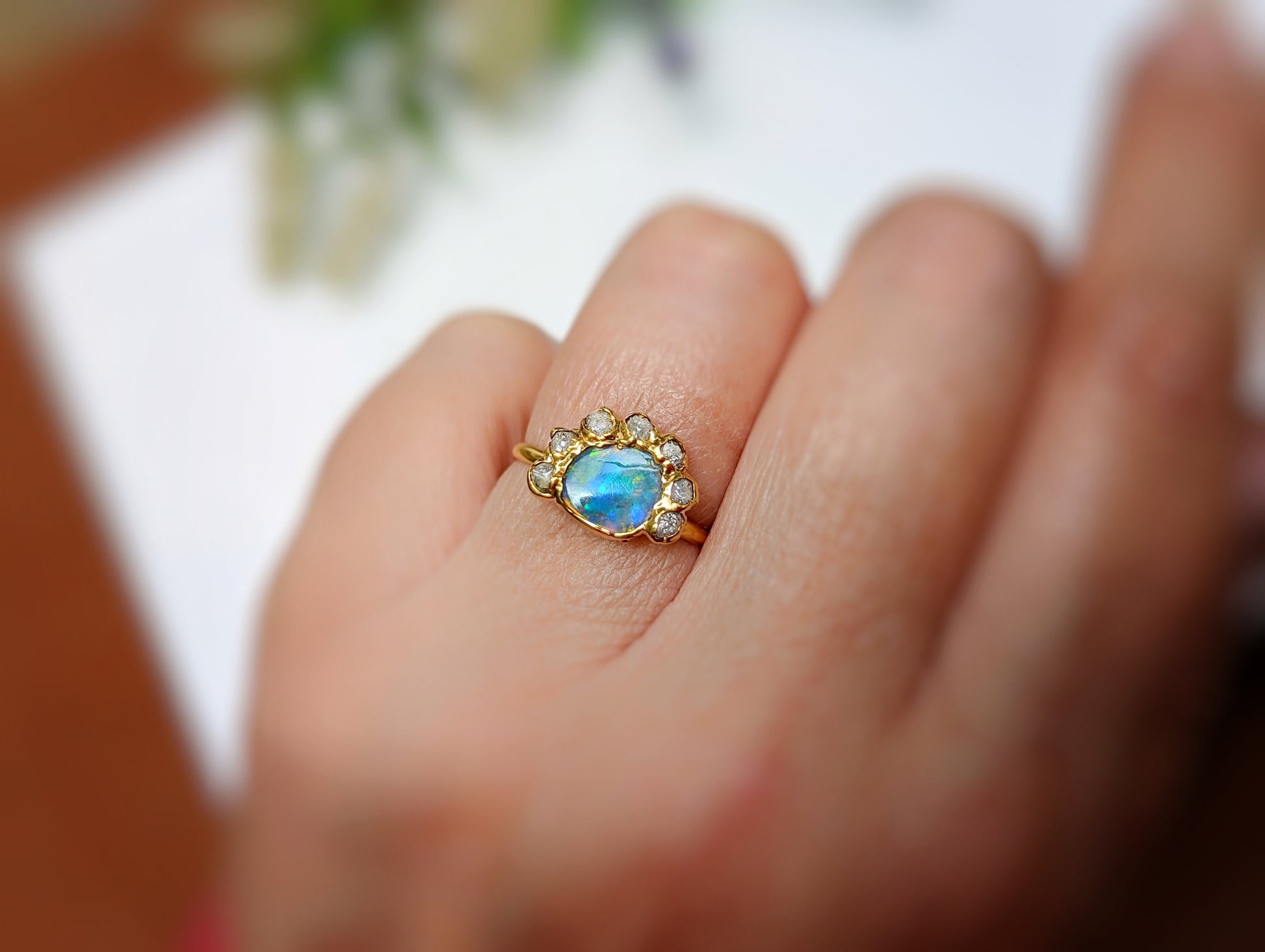 Flower shape Blue Australian Opal and raw diamond Engagement ring in 18k Gold