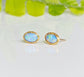 Light Blue Australian Opal stud earrings in unique 18k Gold setting