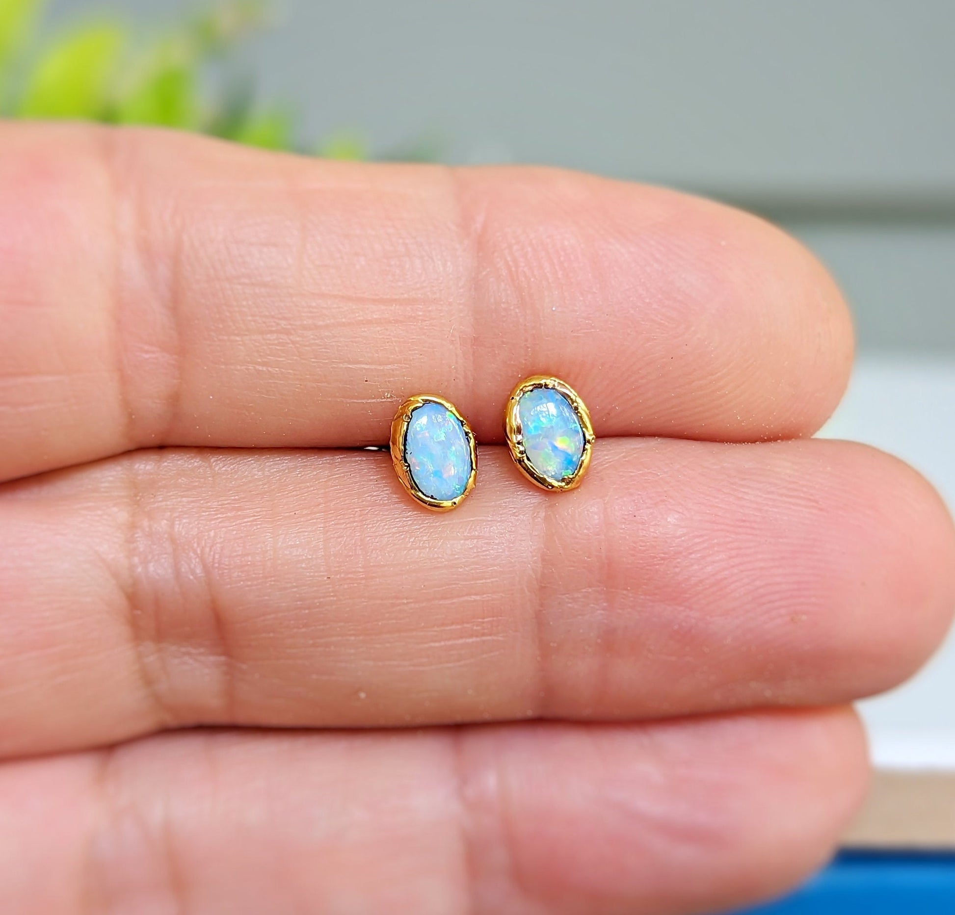 Light Blue Australian Opal stud earrings in unique 18k Gold setting
