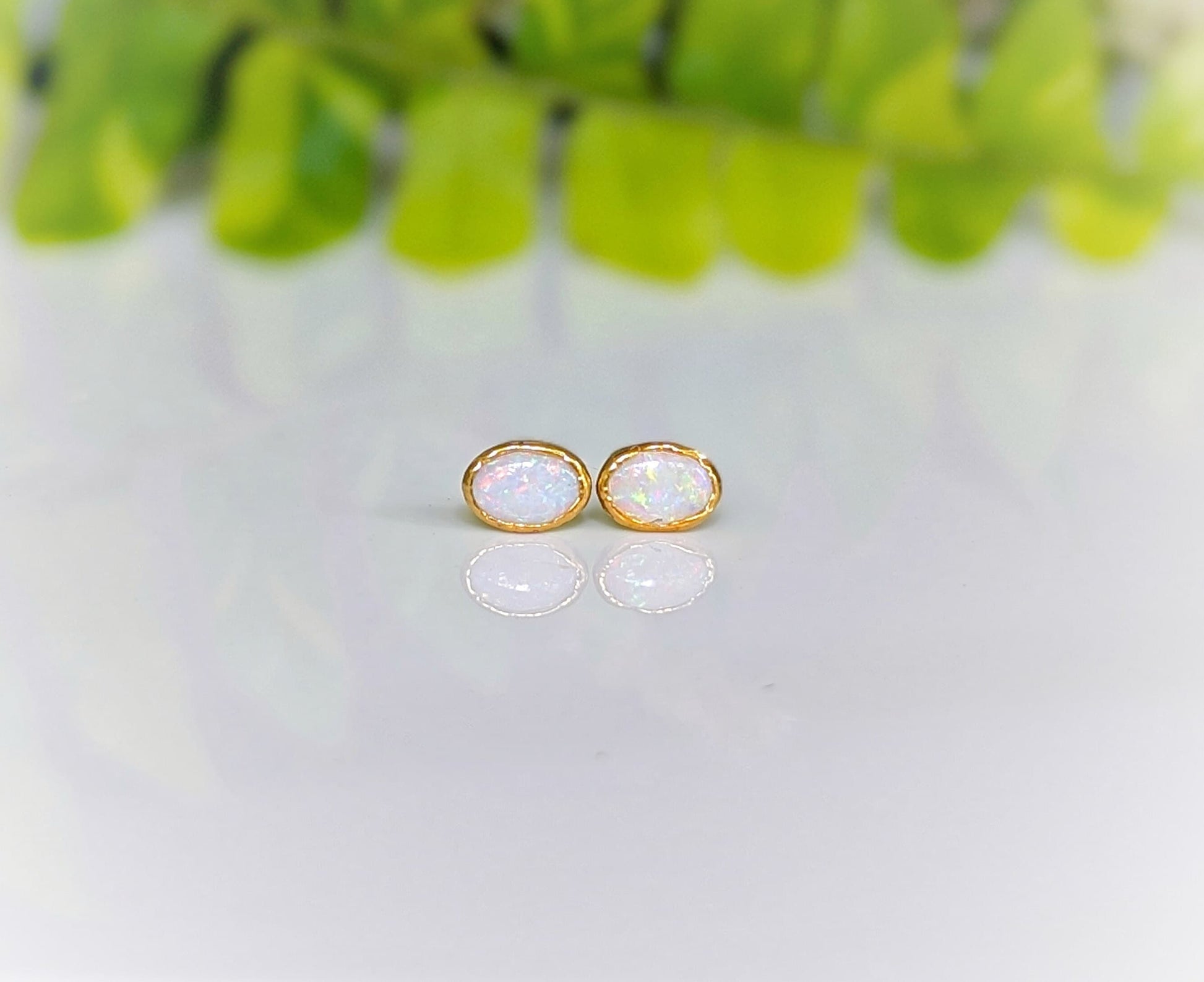 White Australian Opal stud earrings in unique 18k Gold setting