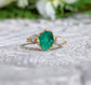Raw Emerald ring in unique 18k Gold setting