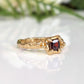 Red square Garnet set by prongs on a Solid 14k Gold Molten textured band